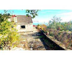 Bel casolare a piano terra con giardino e gran vista sul mare e Taormina