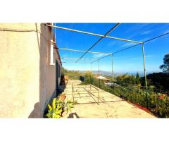 Bel casolare a piano terra con giardino e gran vista sul mare e Taormina