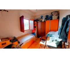 Doppia unità immobiliare con giardino circostante di 5000 mq